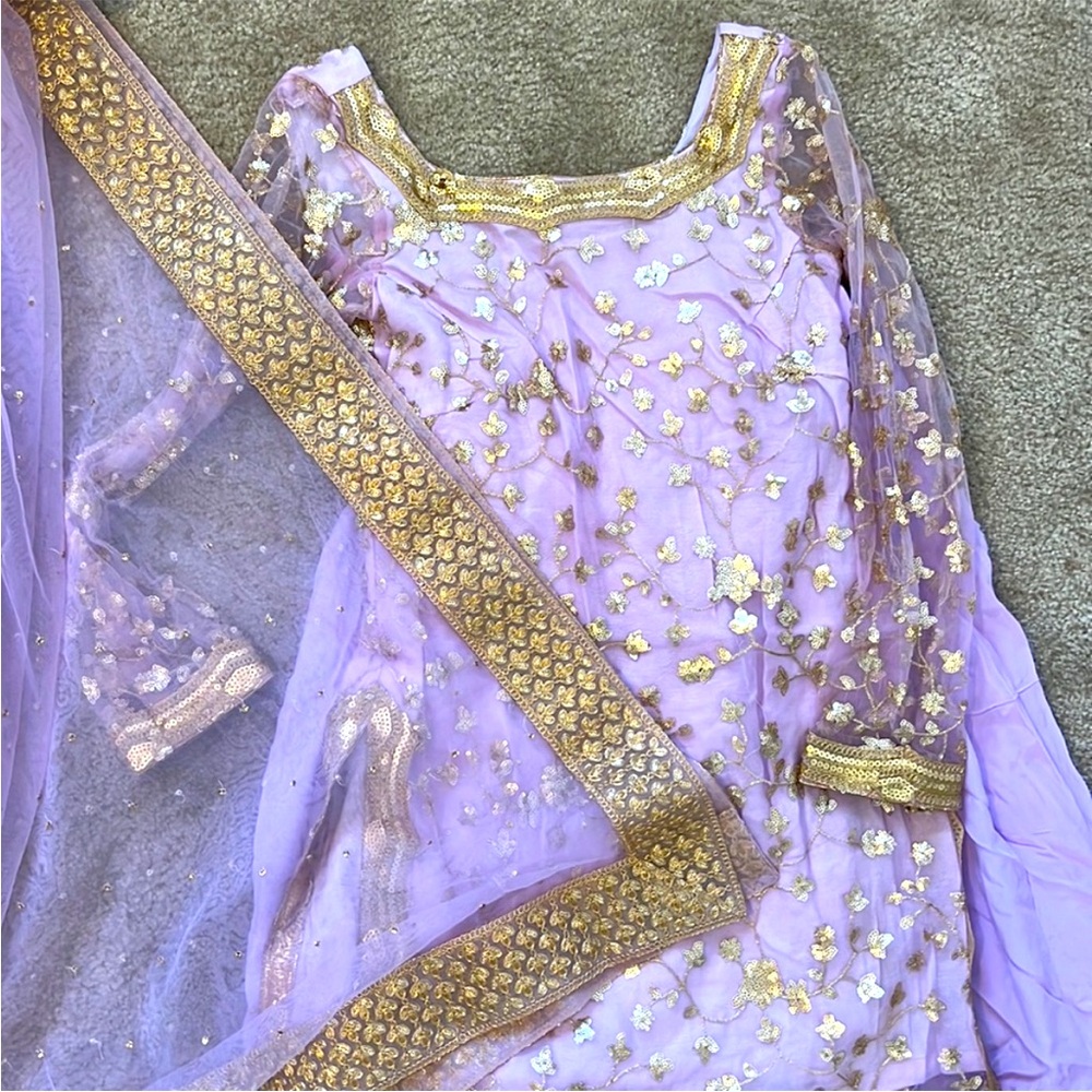 Lavender and Gold Lehenga suit